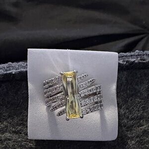 Elegant Silver and Yellow Gemstone Ring